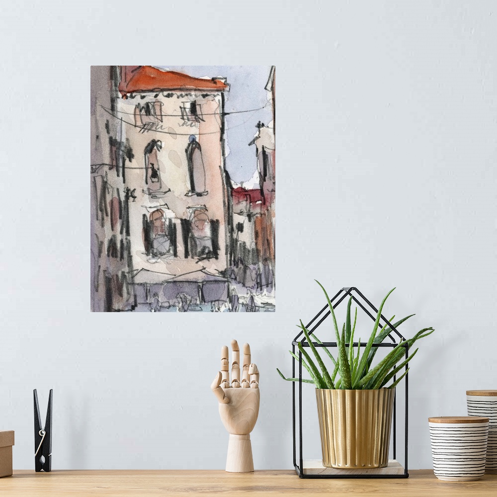 A bohemian room featuring Watercolor cityscape painting of an alley in Venice.
