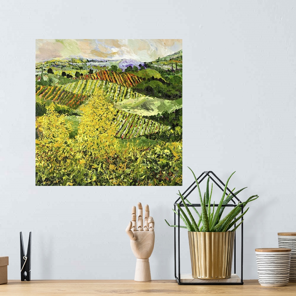 A bohemian room featuring Contemporary painting of a country landscape with two yellow trees looking over crops growing in ...