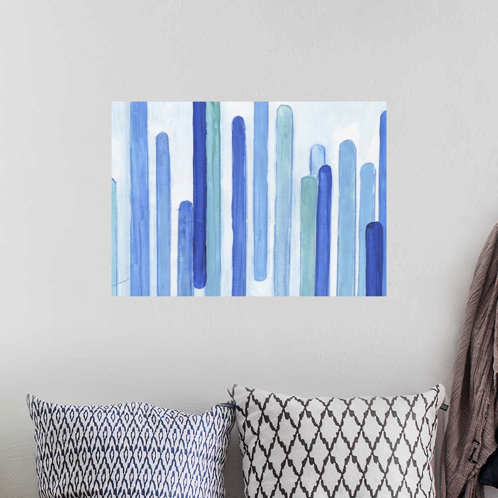 A bohemian room featuring Contemporary abstract artwork made of several vertical lines in blue tones.