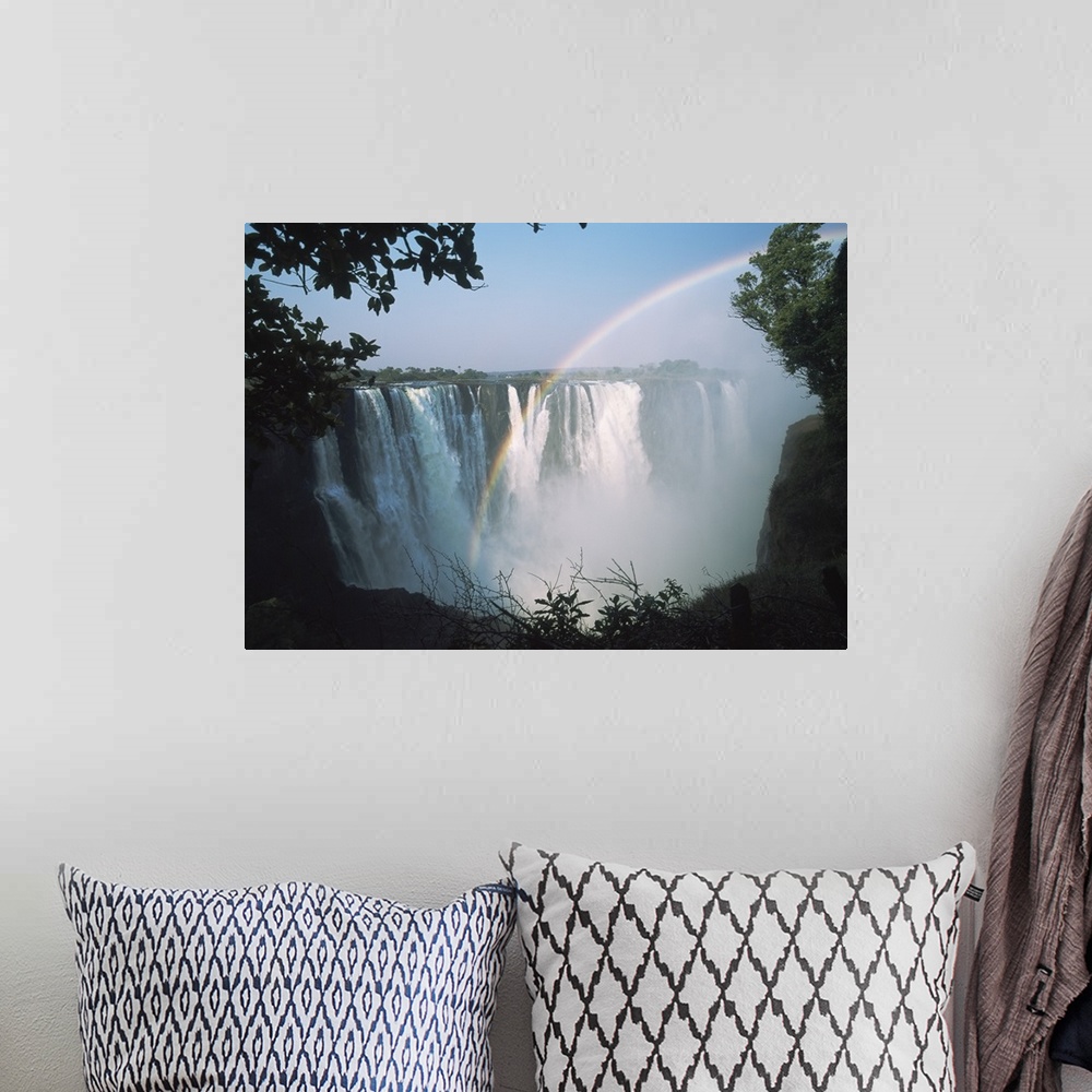 A bohemian room featuring Rainbow In Front Of Victoria Falls; Zimbabwe