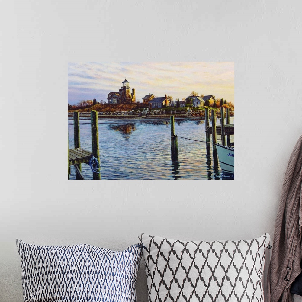 A bohemian room featuring Contemporary artwork of a water scene overlooking harbor with a lighthouse.