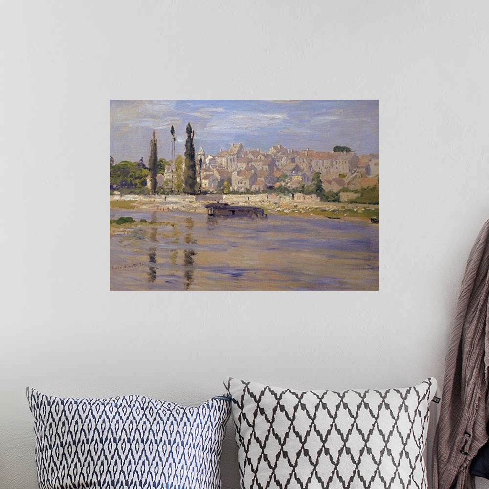 A bohemian room featuring Oversized, landscape, classic art painting of a body of water in the foreground, a city with many...