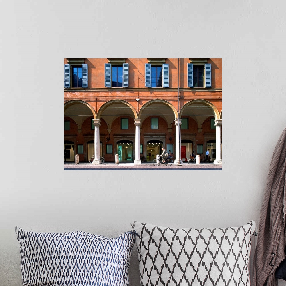 A bohemian room featuring Italy, Emilia-Romagna, Modena, Arcades along Via Emilia
