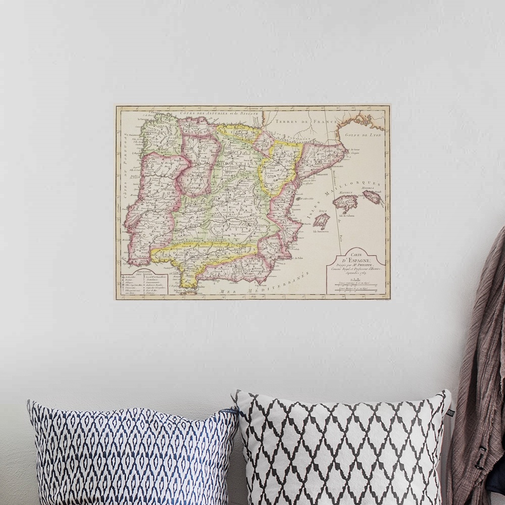 A bohemian room featuring Antique map of Spain and Portugal