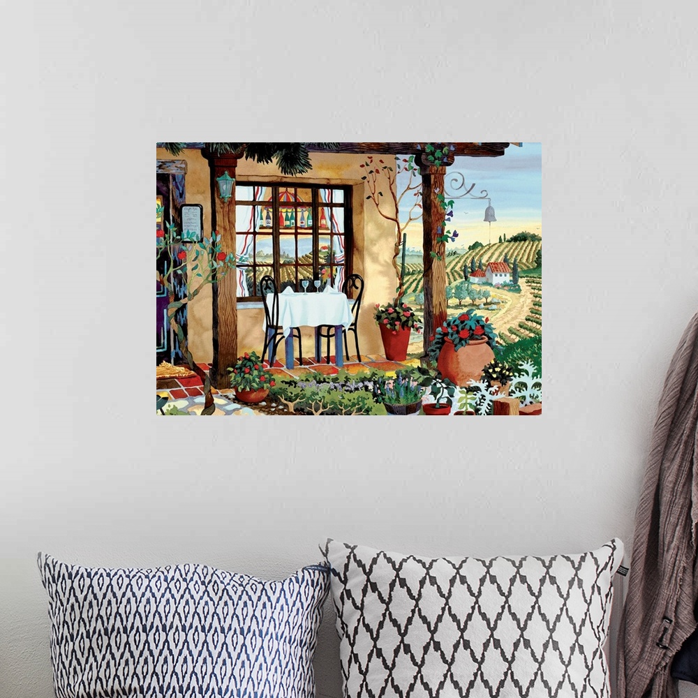 A bohemian room featuring Large canvas painting of a vineyard with a small restaurant in the foreground and a flower garden.