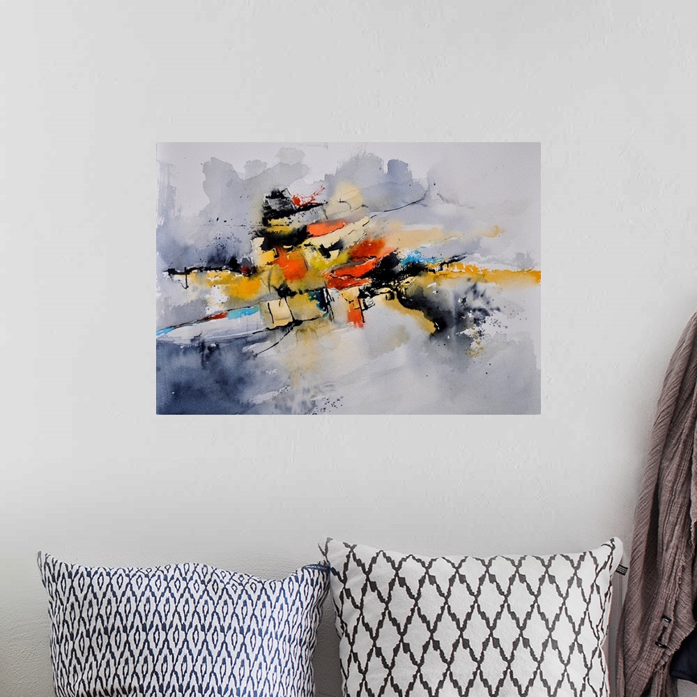 A bohemian room featuring Abstract watercolor painting in blended shades of black, orange, blue and yellow.