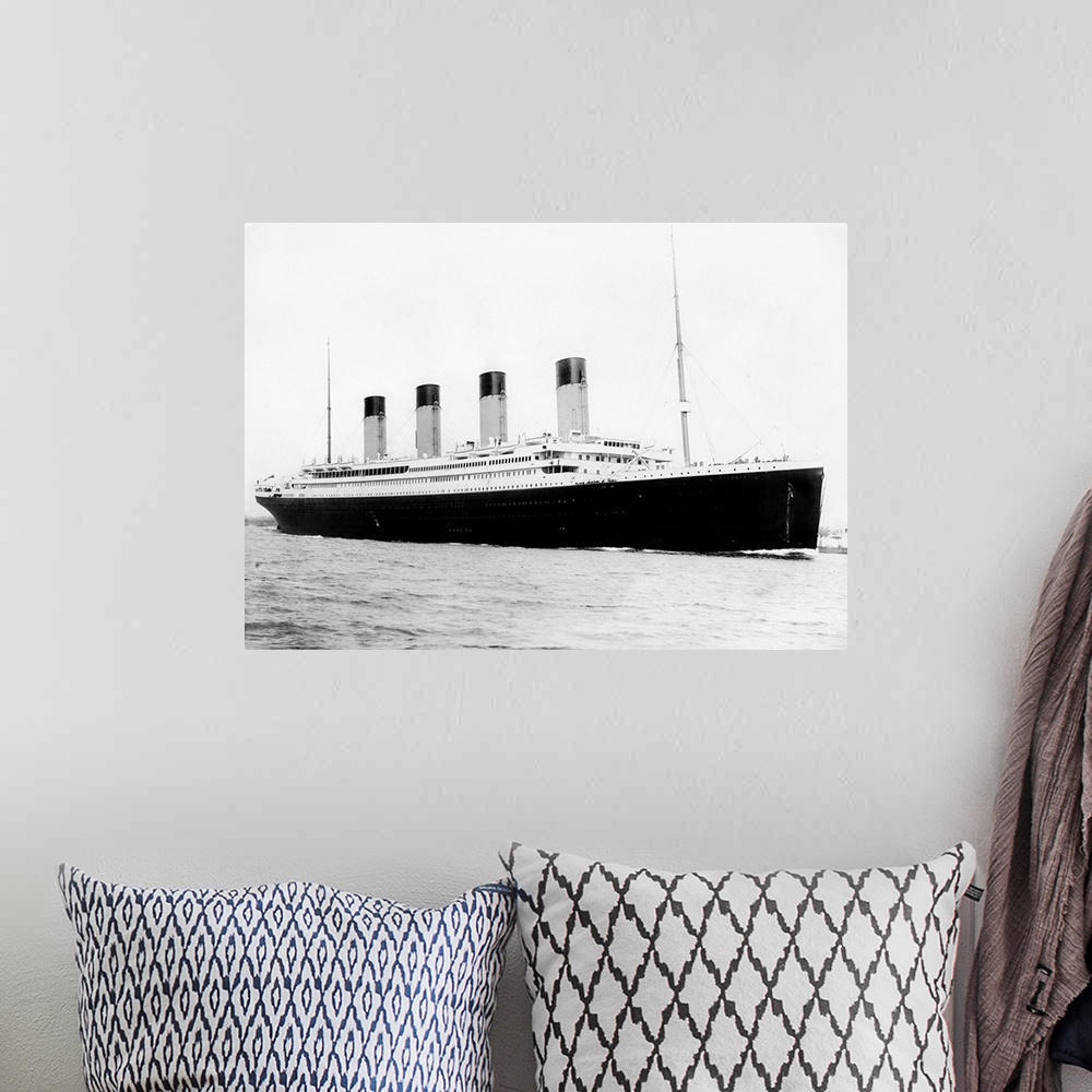 A bohemian room featuring Digitally restored vintage maritime history photo of the RMS Titantic departing Southampton on Ap...