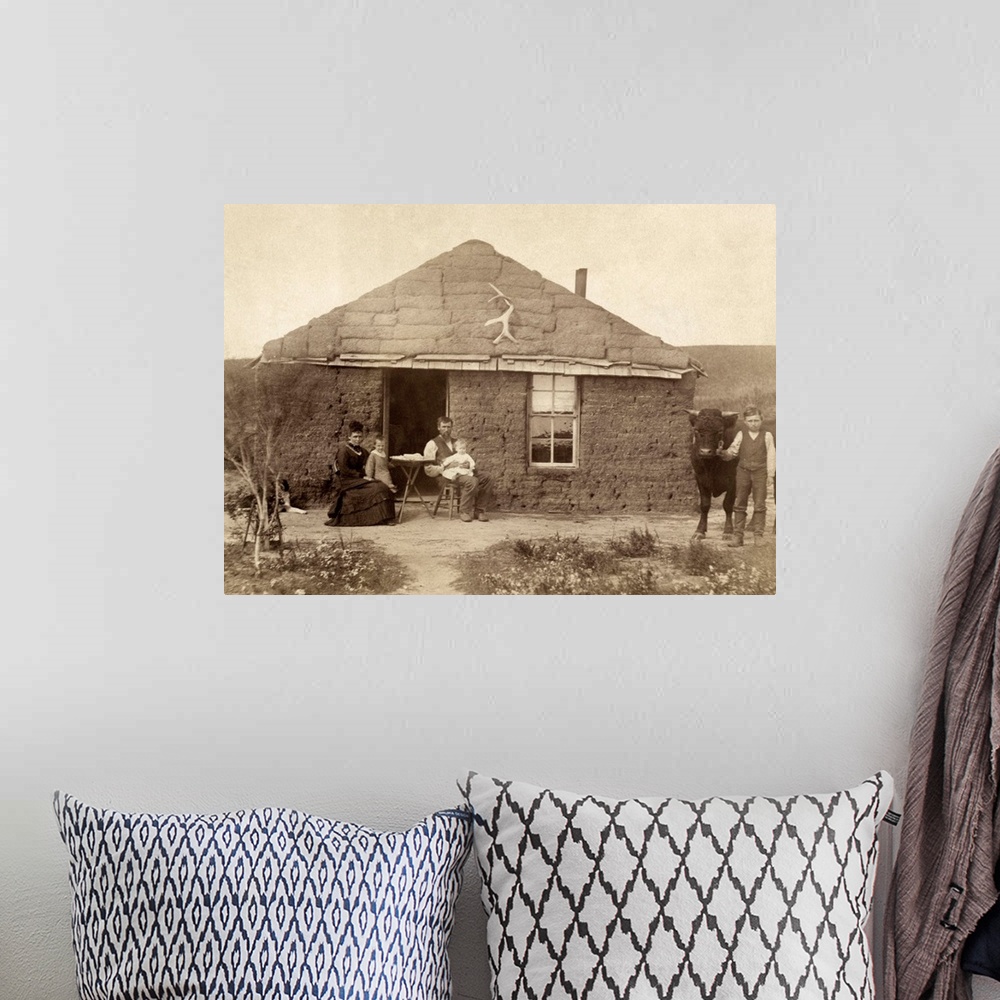 A bohemian room featuring Nebraska, Settlers, C1886. Family Of Homesteaders, Photographed Outside Of their Sod House With A...
