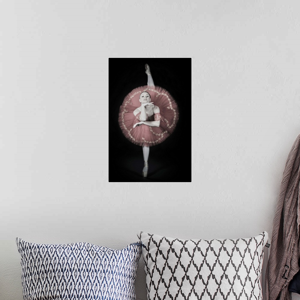 A bohemian room featuring Portrait of a ballerina on her toes, with selective coloring.