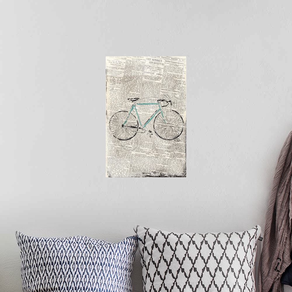 A bohemian room featuring Image of a bicycle on weathered news print.