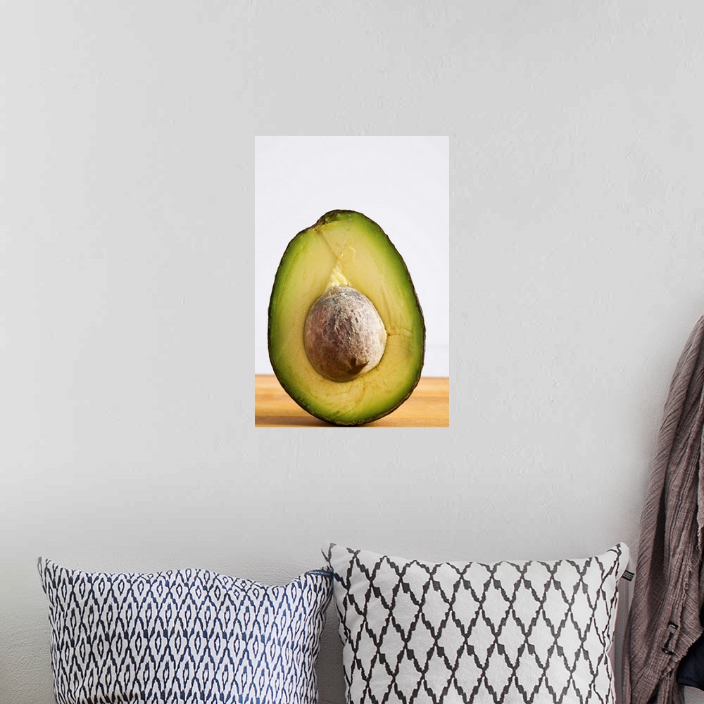 A bohemian room featuring Close Up Of An Avocado Standing Upright Cut In Half With The Pit