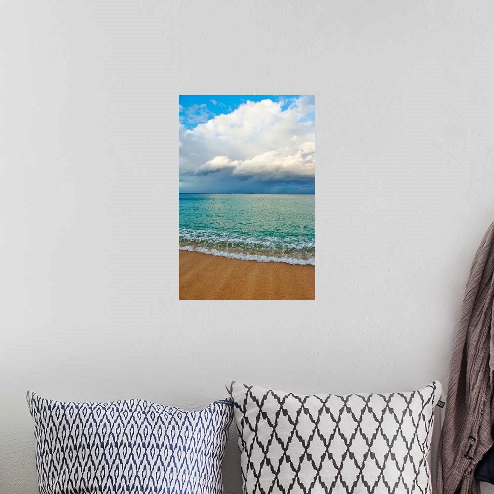 A bohemian room featuring This photograph is taken on a beach in Hawaii of immense clouds that hang in the sky over a teal ...