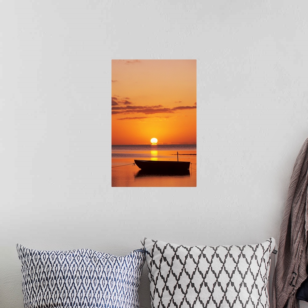 A bohemian room featuring Sun Setting Over Ocean, Boat Silhouetted Against Orange Sky