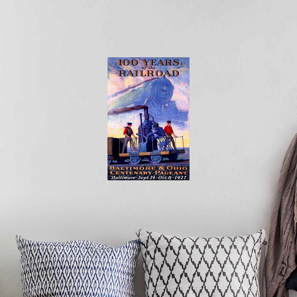 A bohemian room featuring Old print advertising anniversary of the locomotive industry.  There is an image of a train and a...