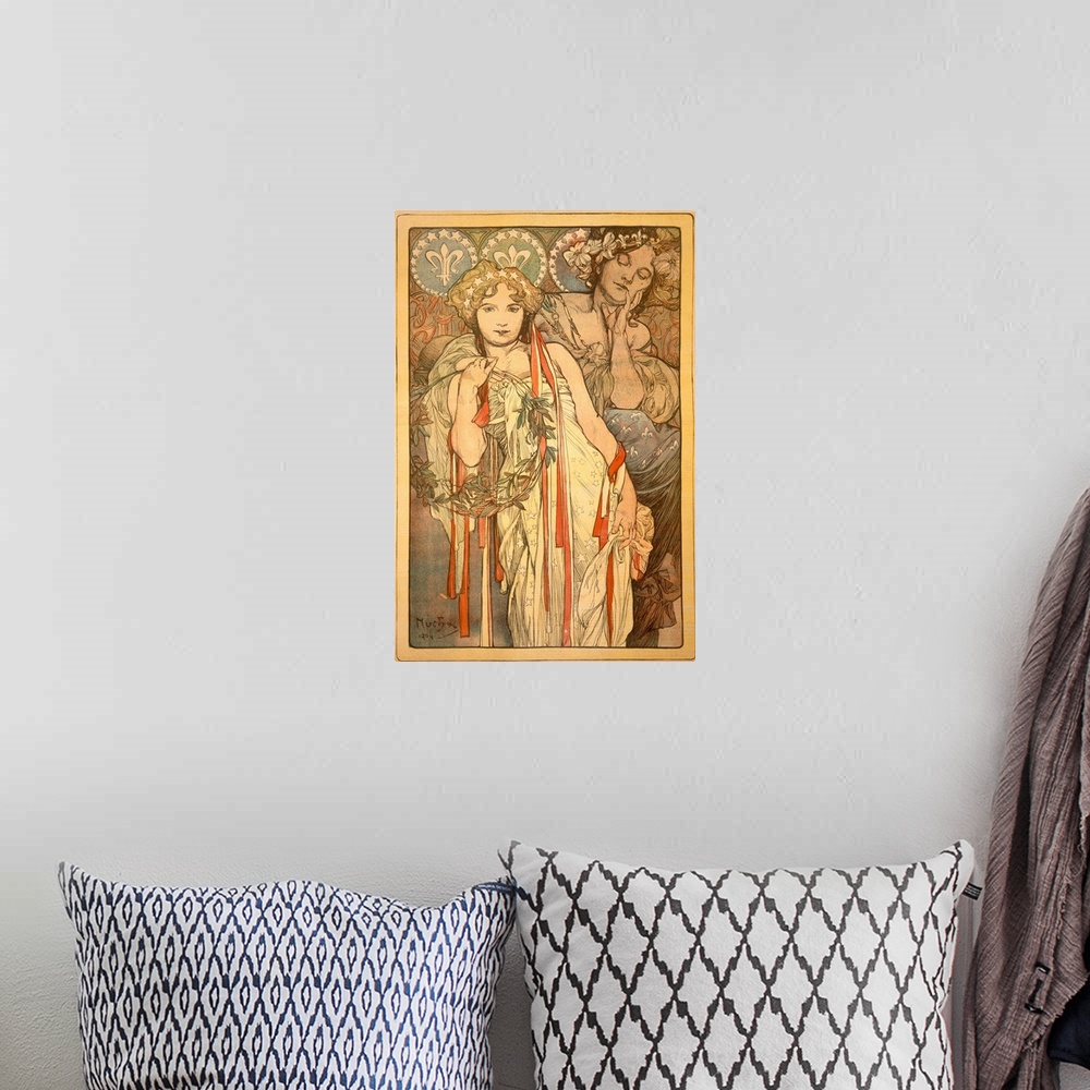 A bohemian room featuring Large, vertical vintage poster art of two women in flowing dresses with elaborate hair pieces.  T...