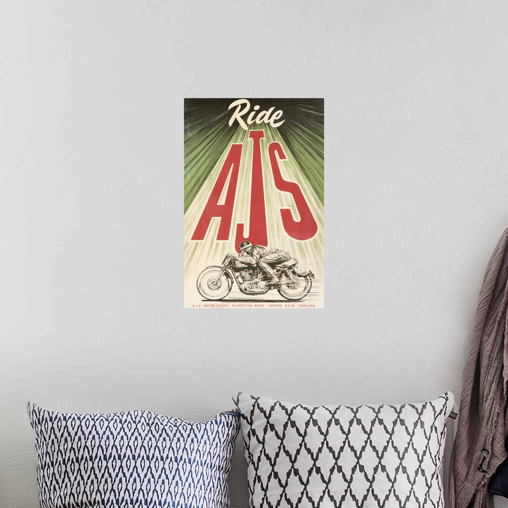 A bohemian room featuring Vintage advertisement for AJS Motorcycles.