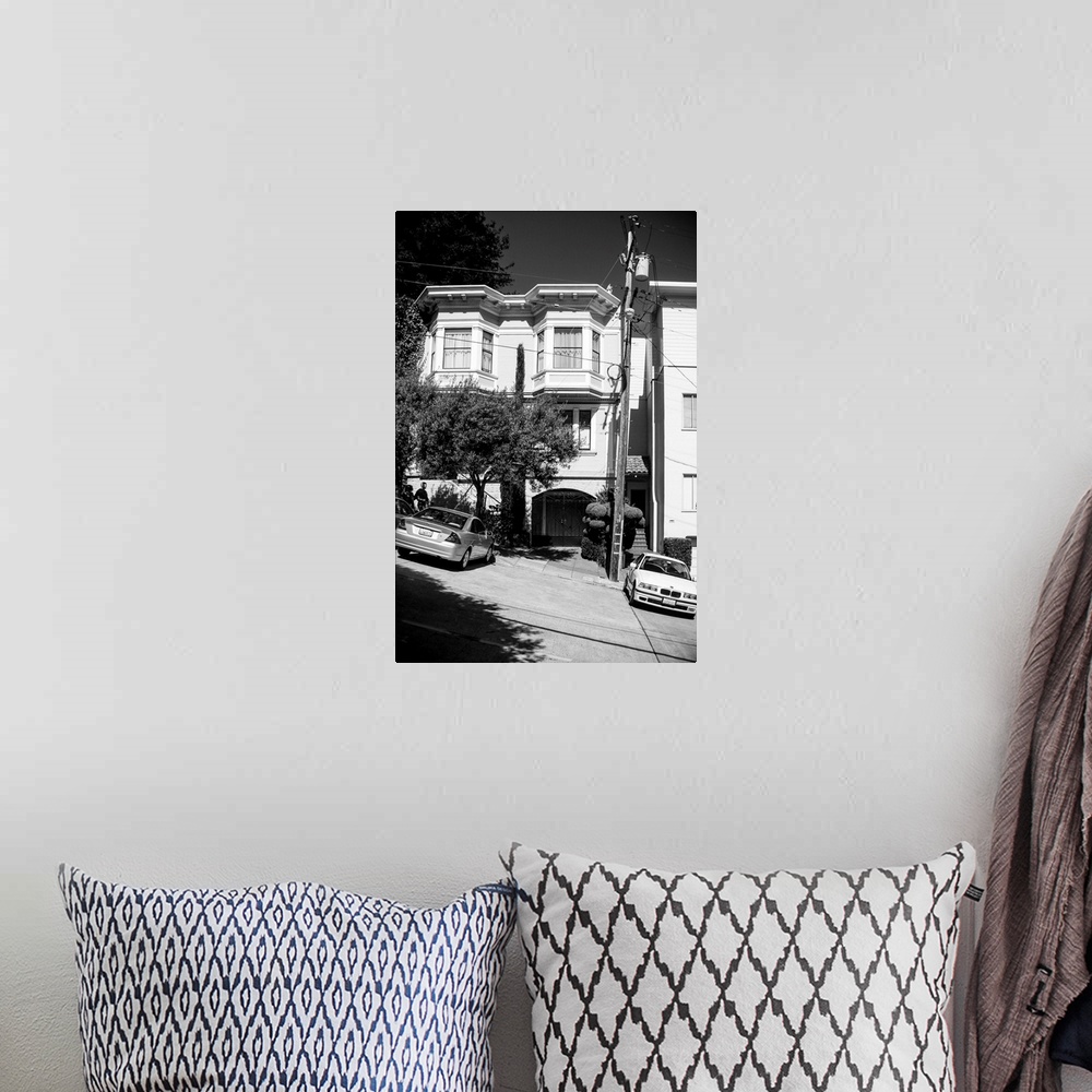 A bohemian room featuring sloped city street, photograph