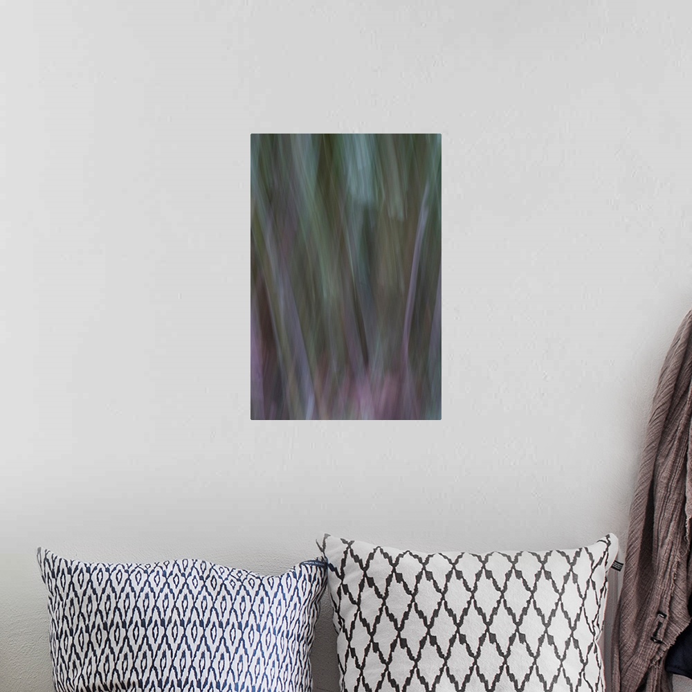 A bohemian room featuring Impressionist photograph of a tree.