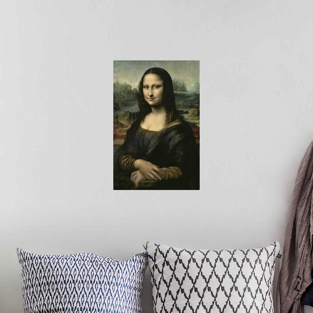 A bohemian room featuring This vertical artwork is a gicloe print of Da Vincios famous painting uncropped and in its entire...