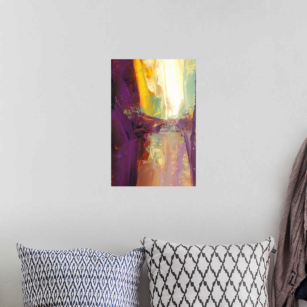 A bohemian room featuring A vertical abstract painting in vibrant colors of purple, yellow and red.