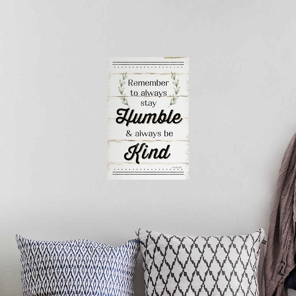 A bohemian room featuring "Remember to always stay Humble and always be Kind"on a white shiplap background.