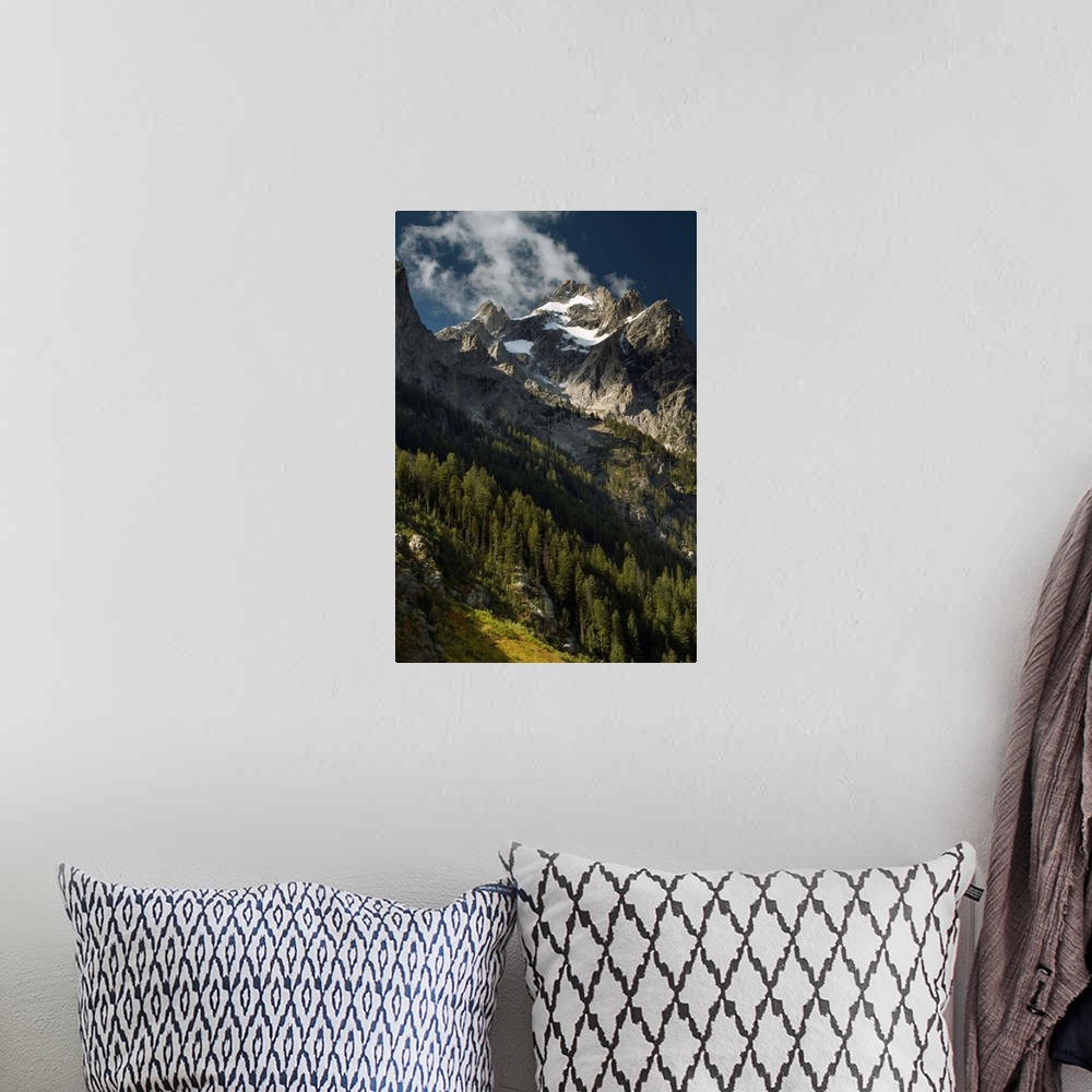 A bohemian room featuring Clouds around the High Peak of Mount Owen, Grand Teton National Park, Wyoming, USA.