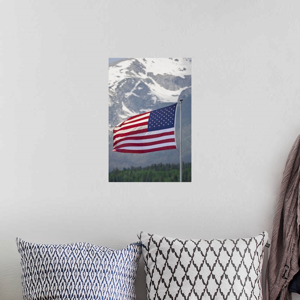 A bohemian room featuring USA, Colorado, Silverthorne. American flag flying against mountain backdrop.