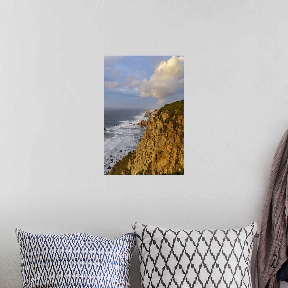 A bohemian room featuring Dramatic seaside cliffs at Cabo do Roca in Colares, Portugal.