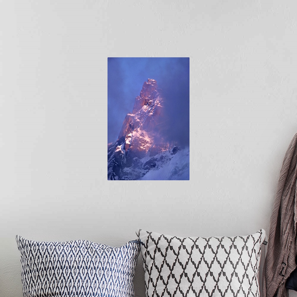 A bohemian room featuring France, Chamonix, Clouds Sift Past The Steep Flanks Of Aiguille Du Midi, Chamonix