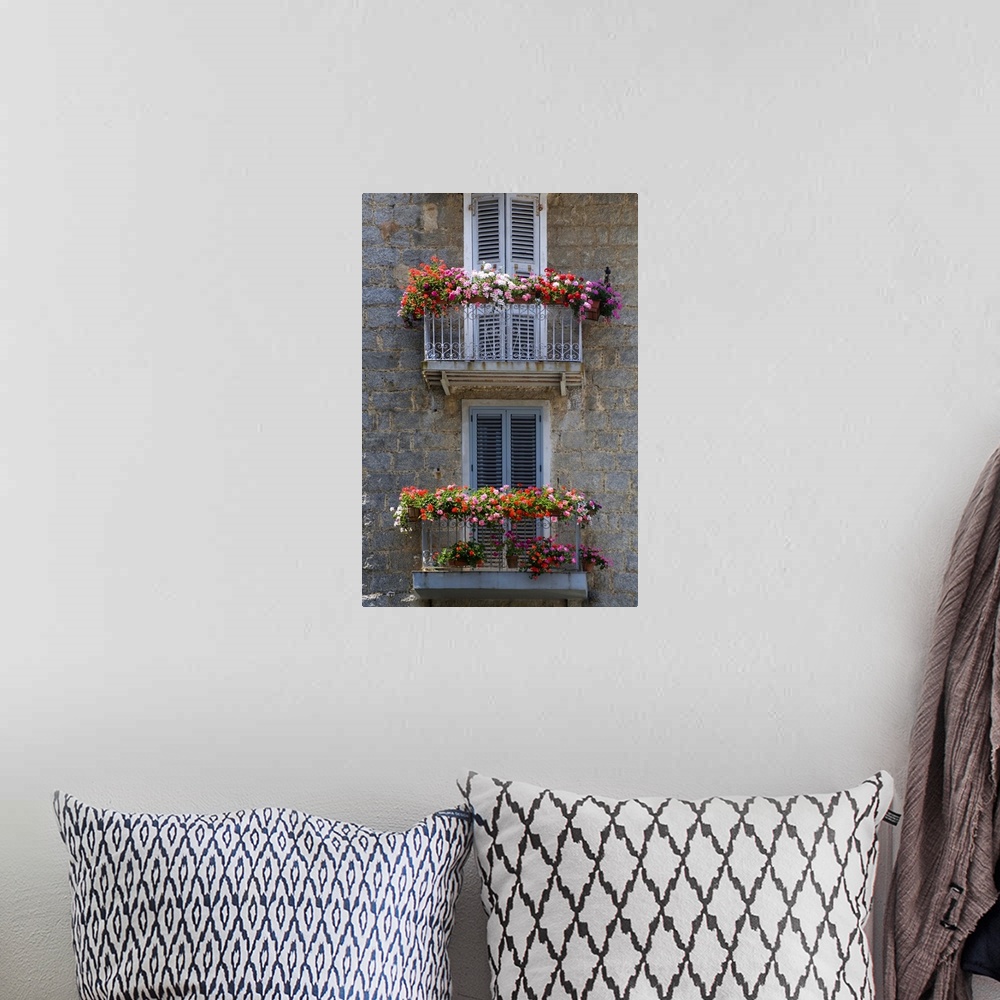 A bohemian room featuring France, Corsica, Flower Boxes On Window Balconies, House In Sartene