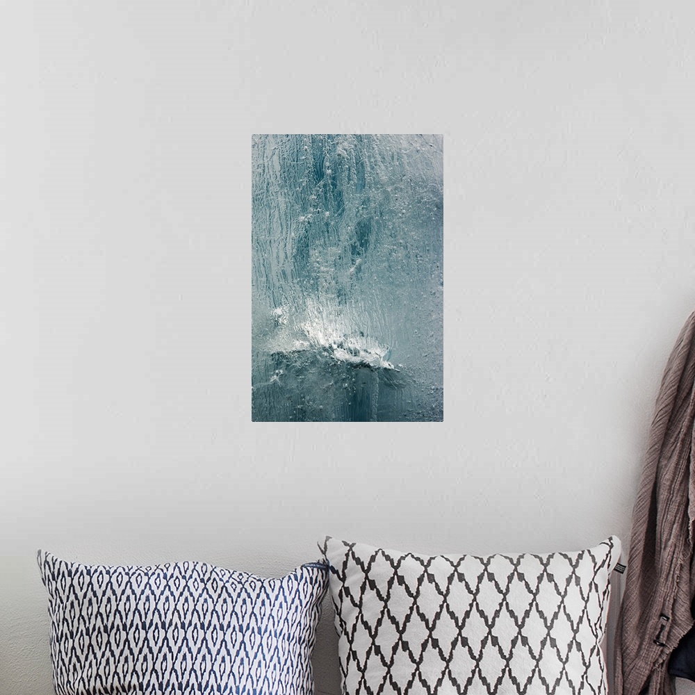 A bohemian room featuring Norway, Svalbard, Spitsbergen Island, Detail of patterns in face of iceberg floating near face of...