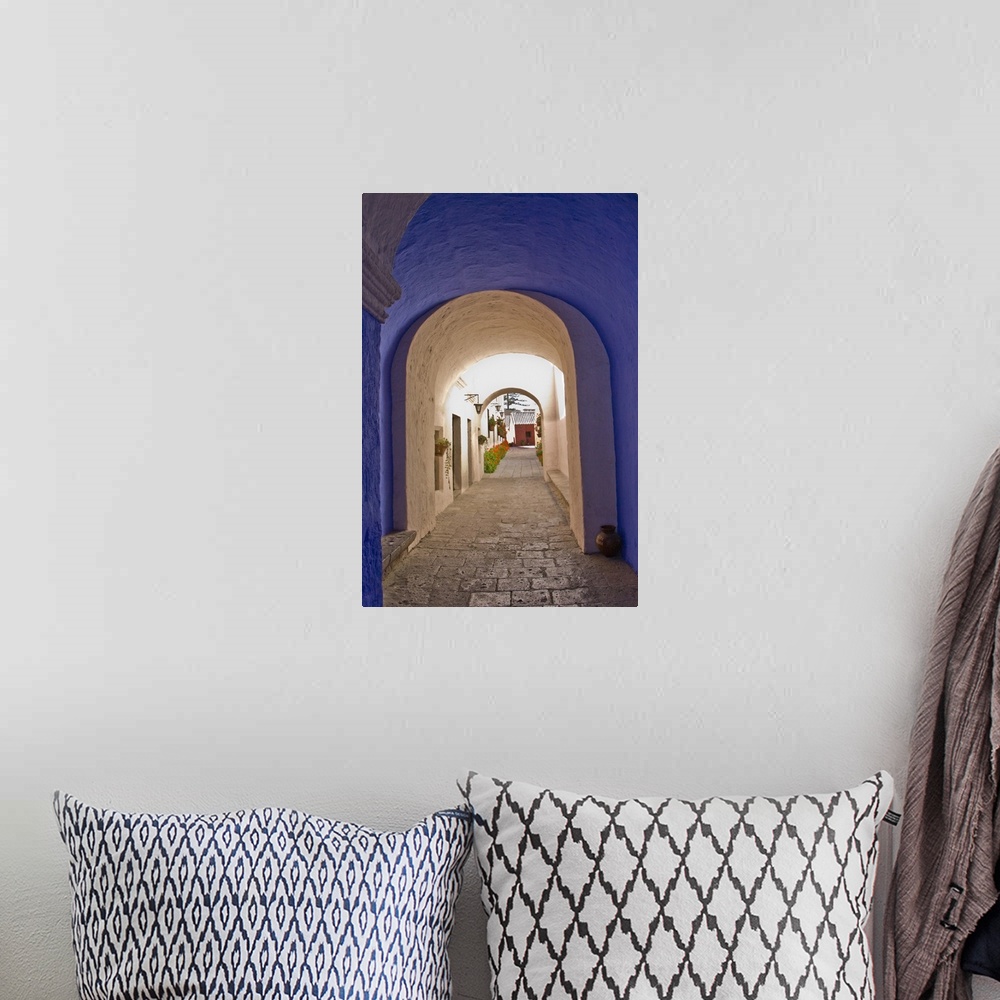 A bohemian room featuring Graceful archways of Monasterio Santa Catalina in the "White City" of Arequipa, Peru.