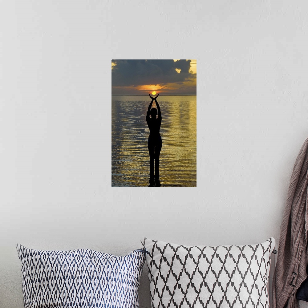 A bohemian room featuring Indonesia, Bali. Woman silhouetted at sunrise on Sanur Beach. Credit as: Jones-Shimlock / Jaynes ...
