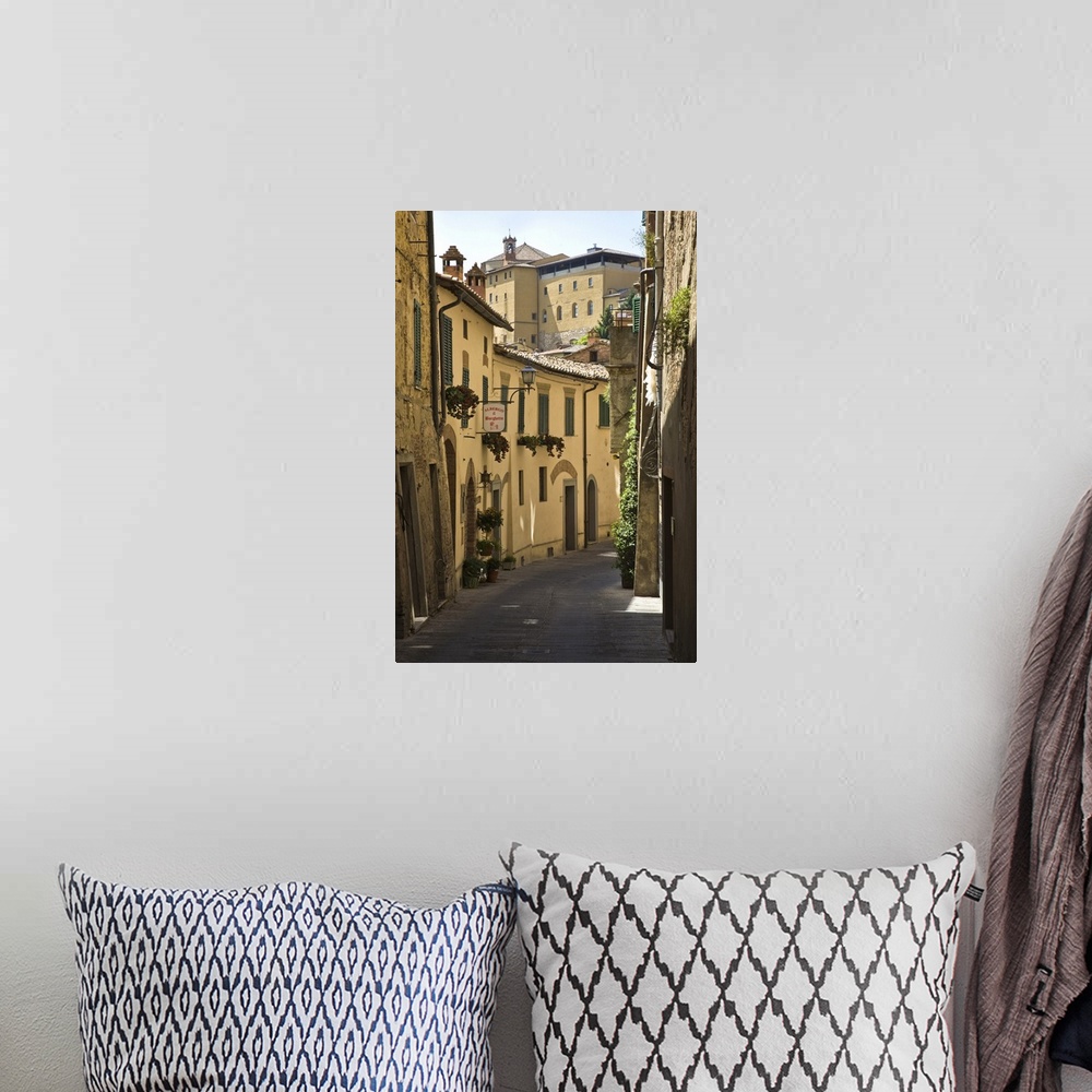 A bohemian room featuring Italy, Montepulciano. Empty street scene.