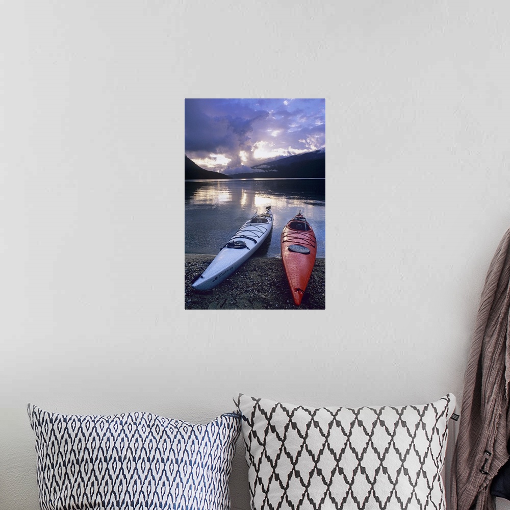 A bohemian room featuring Kayaks at sunset on Rainbow Falls Beach on Azure Lake in Wells Gray Provincial Park, British Colu...