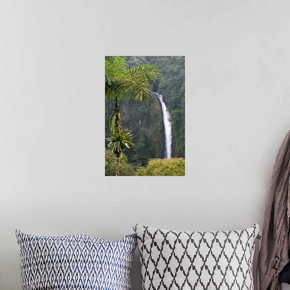 A bohemian room featuring La Fortuna Waterfall in the Arenal Volcano National Park near La Fortuna, San Carlos, Costa Rica.