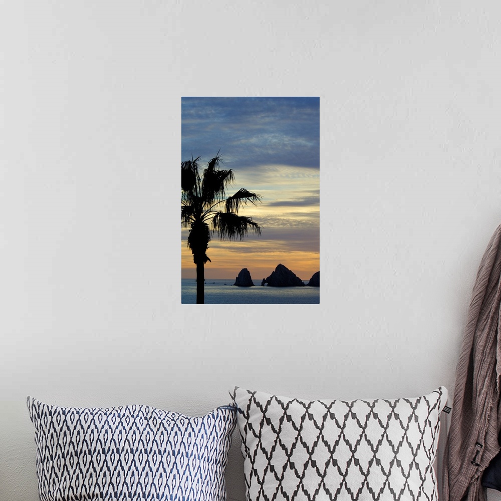 A bohemian room featuring North America, Mexico, Baja California Sur, Cabo San Lucas. Baja sunset palm with famous rock for...