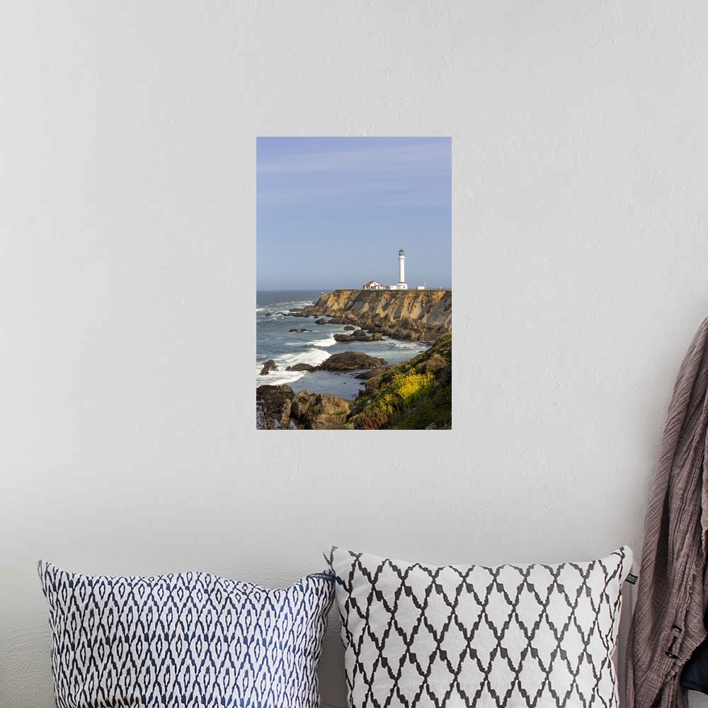 A bohemian room featuring Point Arena lighthouse on cliffs over the Pacific Ocean near Point Arena, California, USA