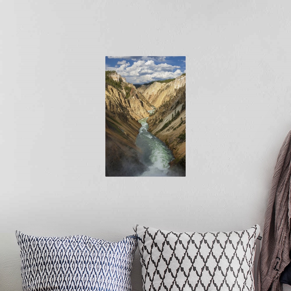 A bohemian room featuring North America, USA, Wyoming, Yellowstone National Park.  Yellowstone River with clouds over the G...