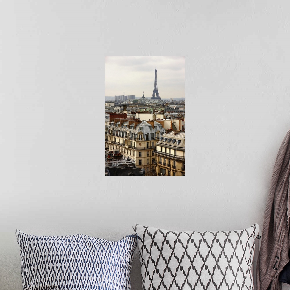 A bohemian room featuring Paris cityscape with Eiffel Tower and Great Palace.