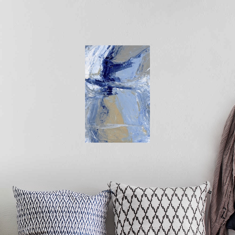 A bohemian room featuring A contemporary abstract painting using various blue tones in aggressive strokes.