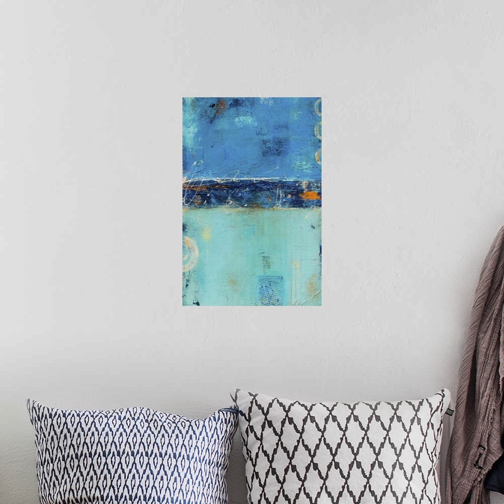 A bohemian room featuring Contemporary abstract painting in shades of blue and teal, with small ring shapes.
