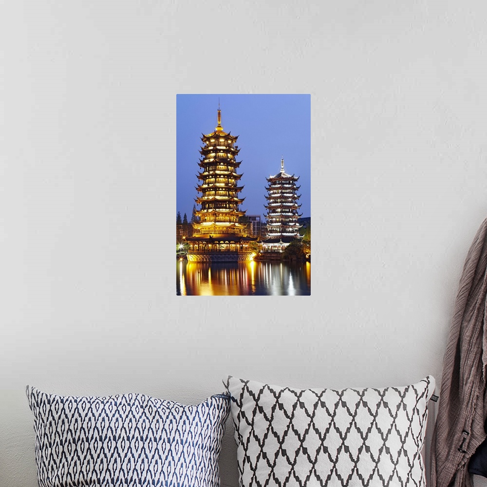 A bohemian room featuring China, Guangxi, Guilin, Sun and Moon Pagodas on Shan Lake.