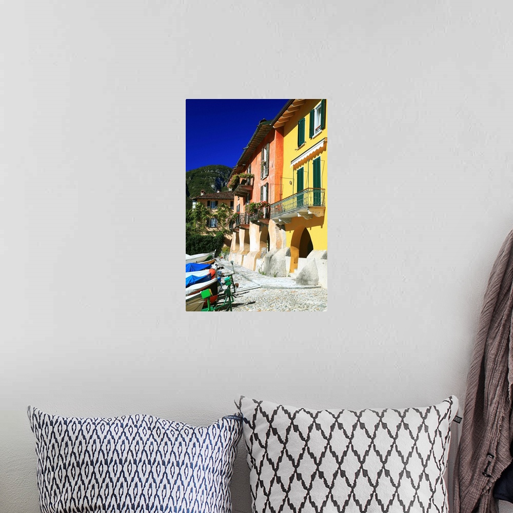 A bohemian room featuring Italy, Lombardy, Mediterranean area, Lecco district, Como Lake, Mandello del Lario, The coloured ...