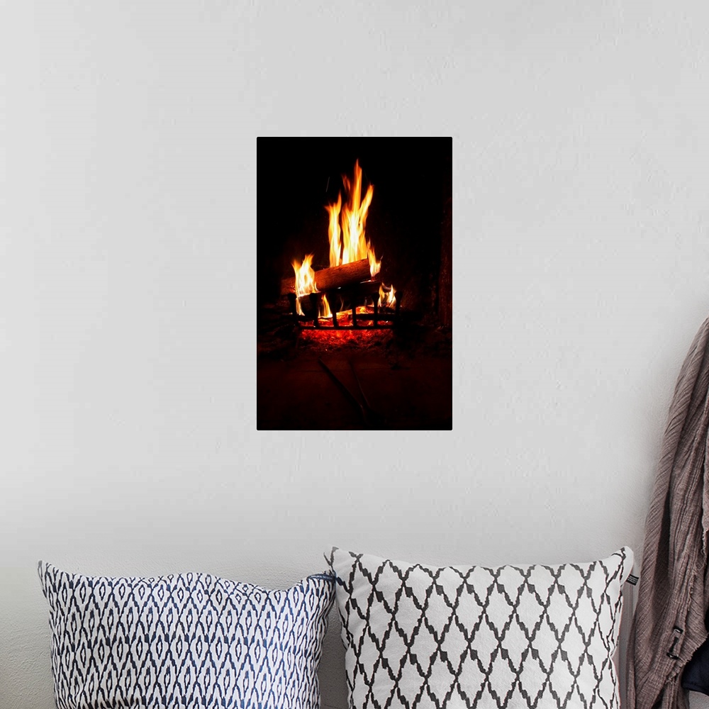 A bohemian room featuring Italy, Manziana, Roma district, Wood log burning in a fireplace