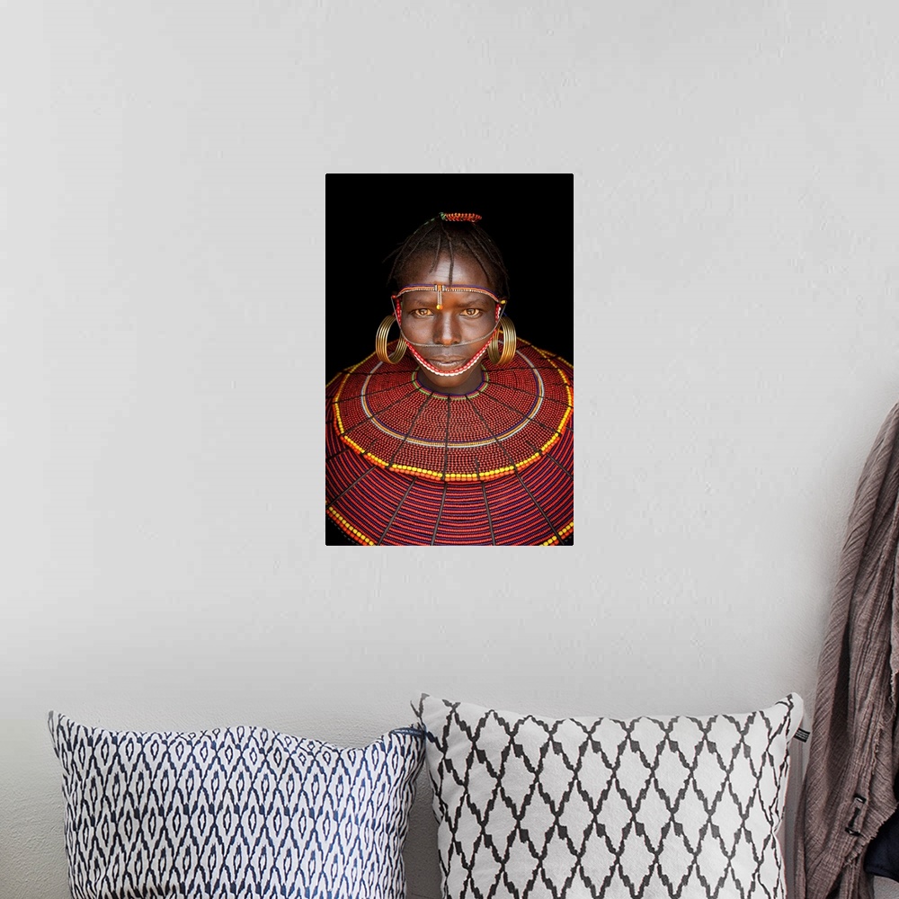 A bohemian room featuring Kenya, Central, Pokot girl in traditional clothing.