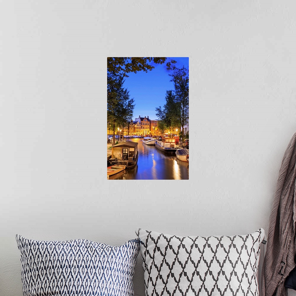 A bohemian room featuring Netherlands, North Holland, Benelux, Amsterdam, Groenburgwal Canal at night.