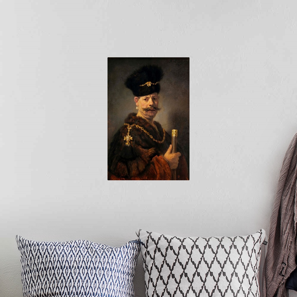 A bohemian room featuring A Polish Nobleman, by Rembrandt van Rijn, 1637, Dutch painting, oil on panel. This is a costume p...