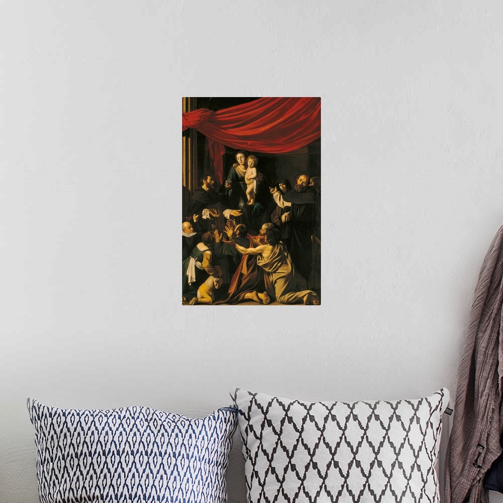 A bohemian room featuring Madonna of the Rosary, by Michelangelo Merisi known as Caravaggio, 1606 - 1607, 17th Century, oil...