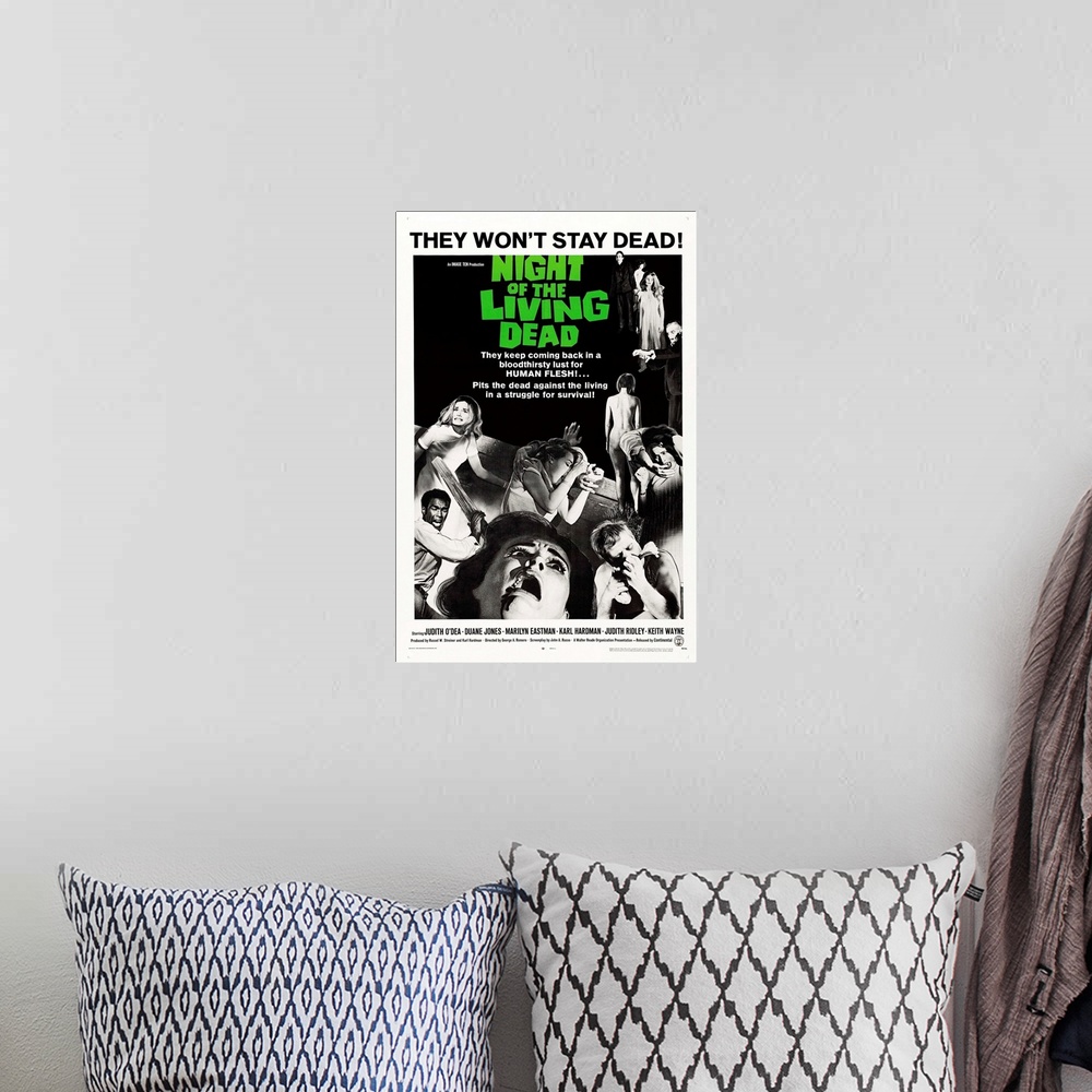 A bohemian room featuring Night Of The Living Dead - Vintage Movie Poster